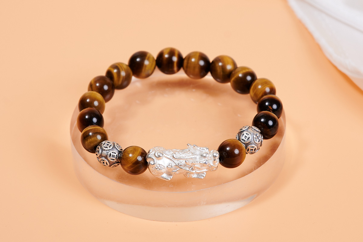 Vòng đá mắt hổ mix charm