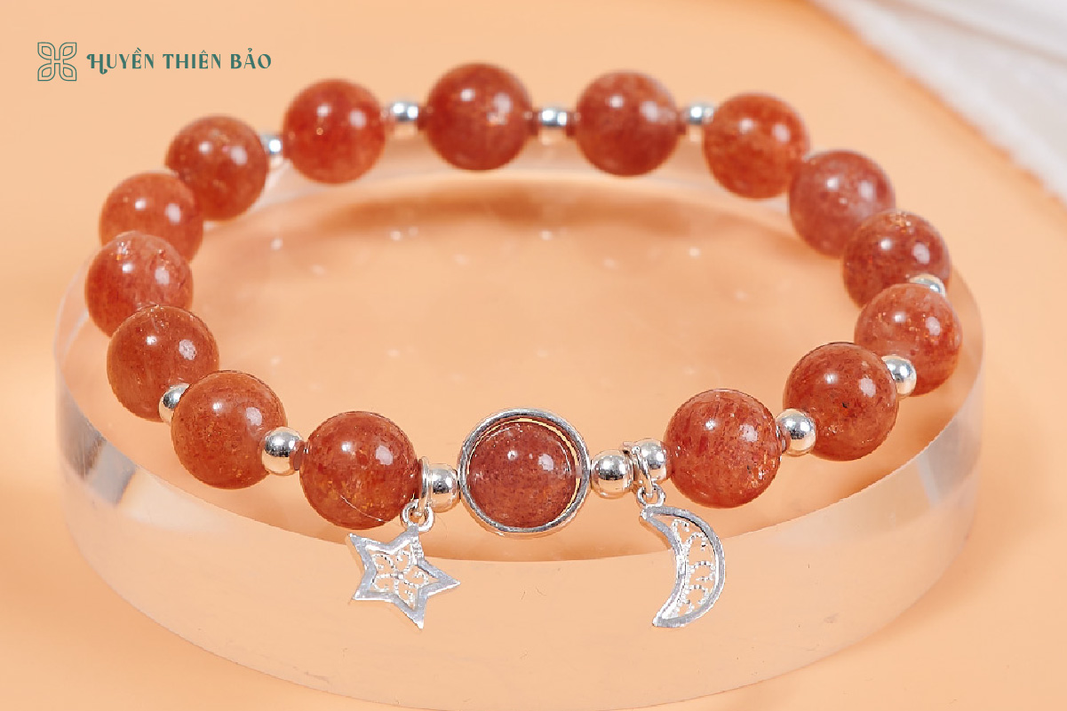 Vòng tay đá mặt trời mix charm
